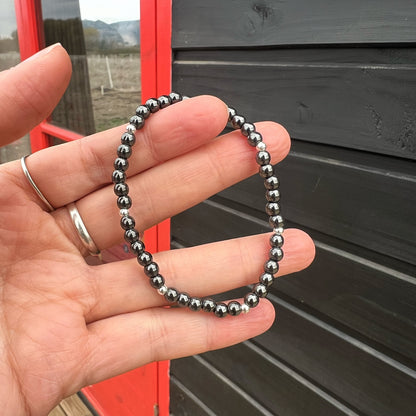 PULSERA ELASTICADA "Estabilidad y fortaleza" | Hematita | Plata 925