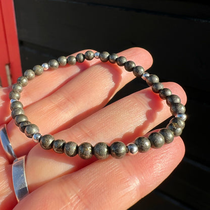 PULSERA ELASTICADA "Acción y prosperidad" | Pirita | Plata 925
