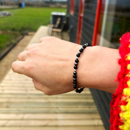 Pulsera elasticada"Protección Energética" | Turmalina negra y Hematita | Pelotitas Plata 925