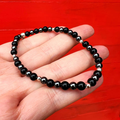 Pulsera elasticada"Protección Energética" | Turmalina negra y Hematita | Pelotitas Plata 925