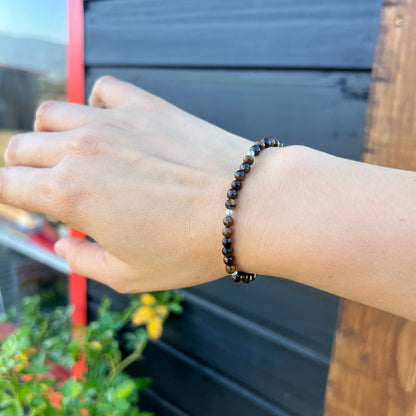 PULSERA ELASTICADA "FUERZA INTERIOR Y SEGURIDAD" | Ojo de tigre | Plata 925